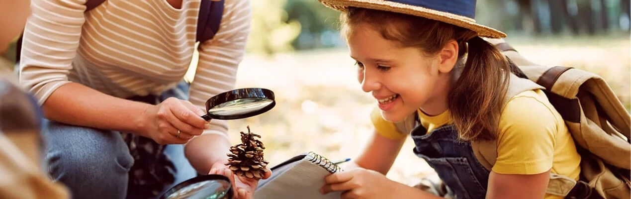 Family outside learning about nature