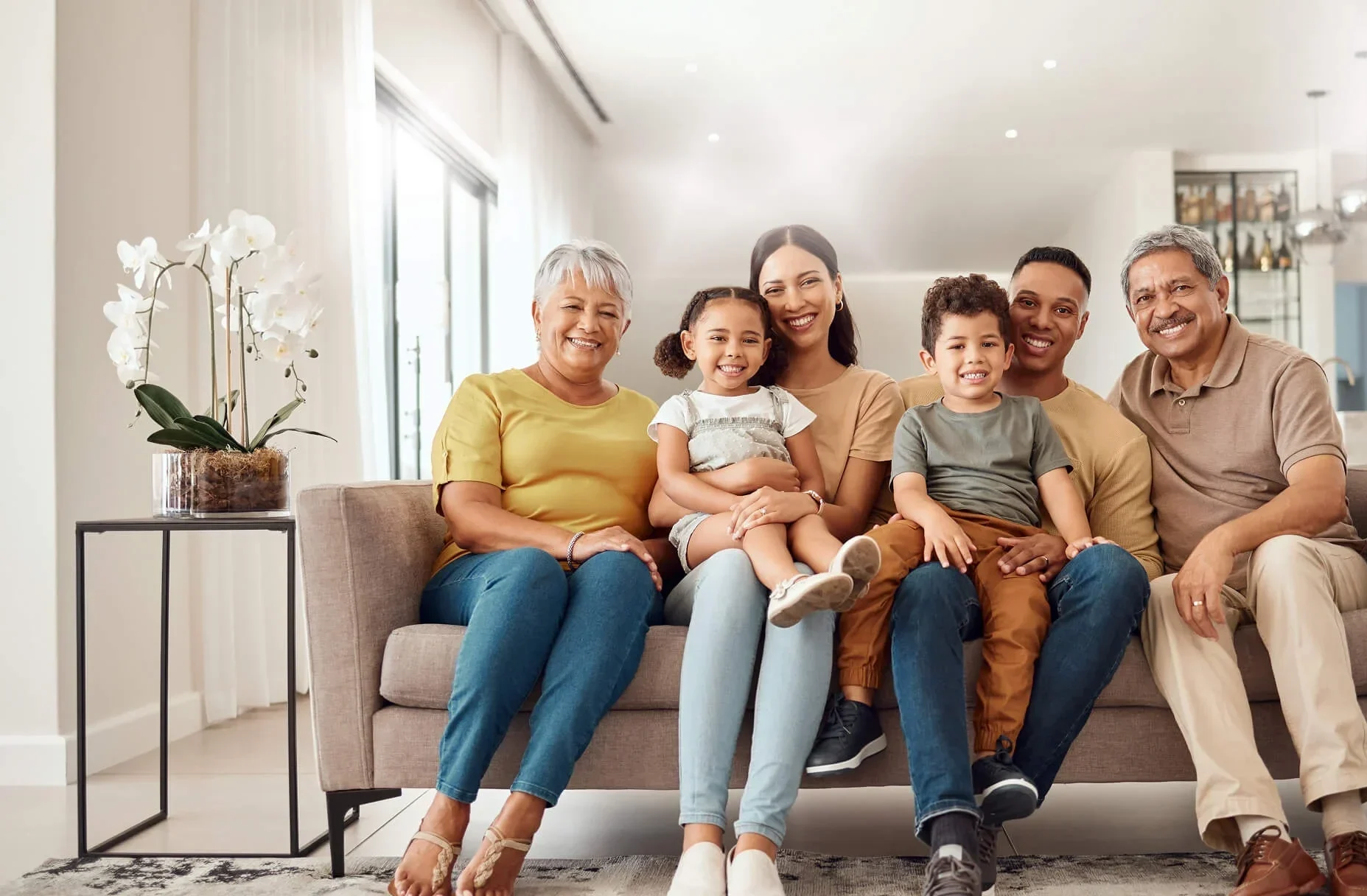 Multi generational family sitting on a couch